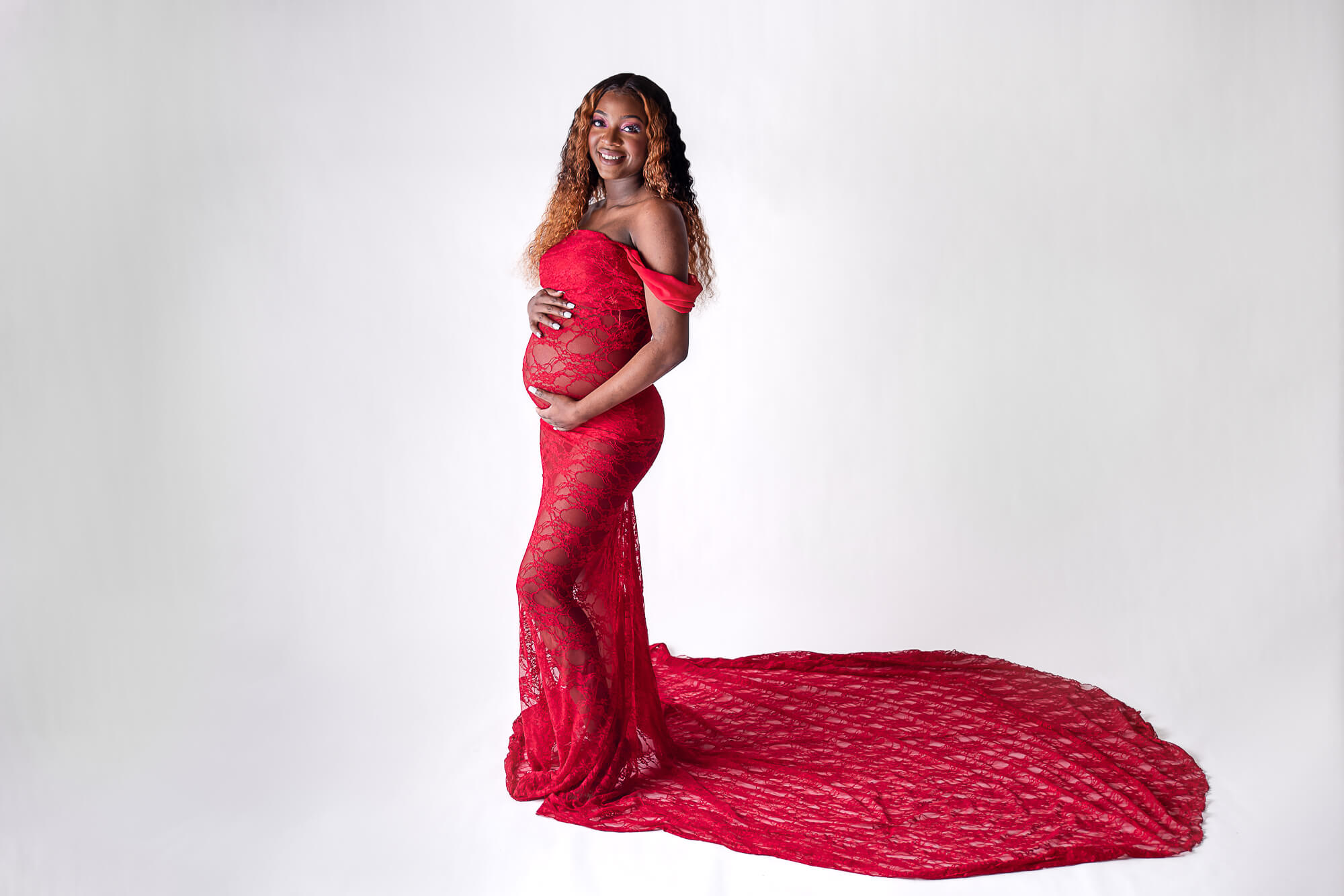 Red gown fine art maternity session with Northeast Ohio photographer