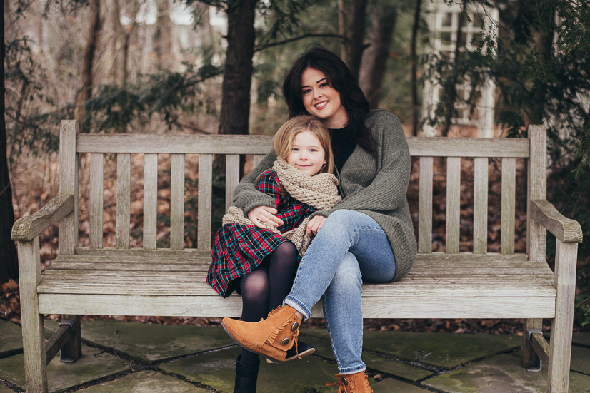 mom and daughter sitting on bench kids birthday party cleveland oh family photographer