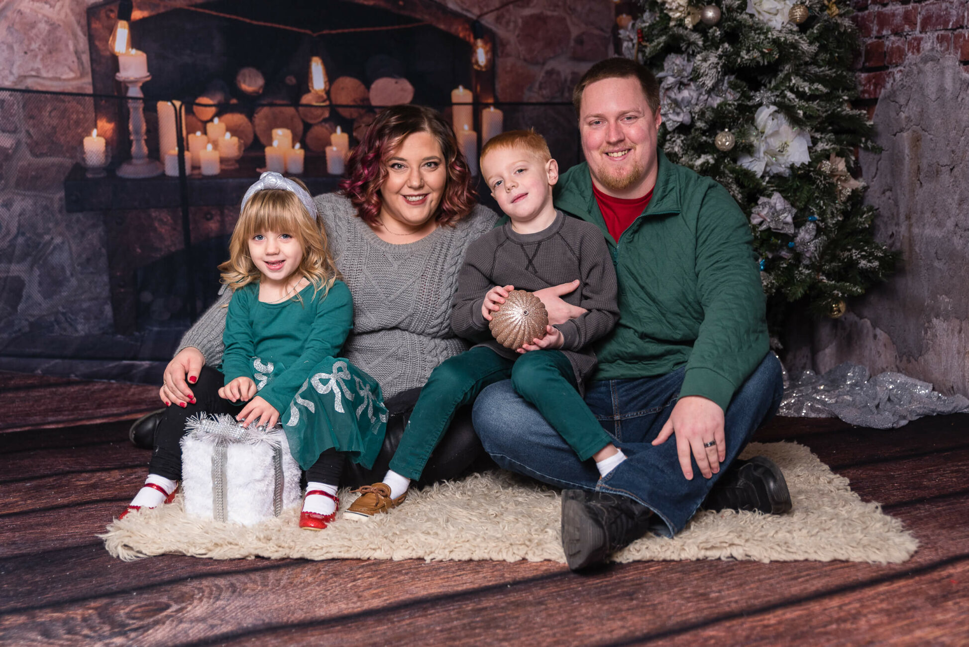 Family in studio holiday session for lego® store beachwood with cleveland family photographer