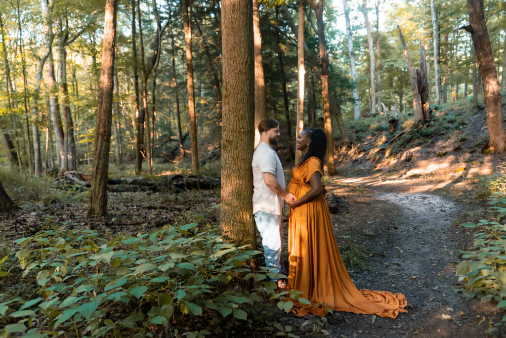 Mother and father looking at each other during maternity session Dr. Quirk Youngstown Ohio