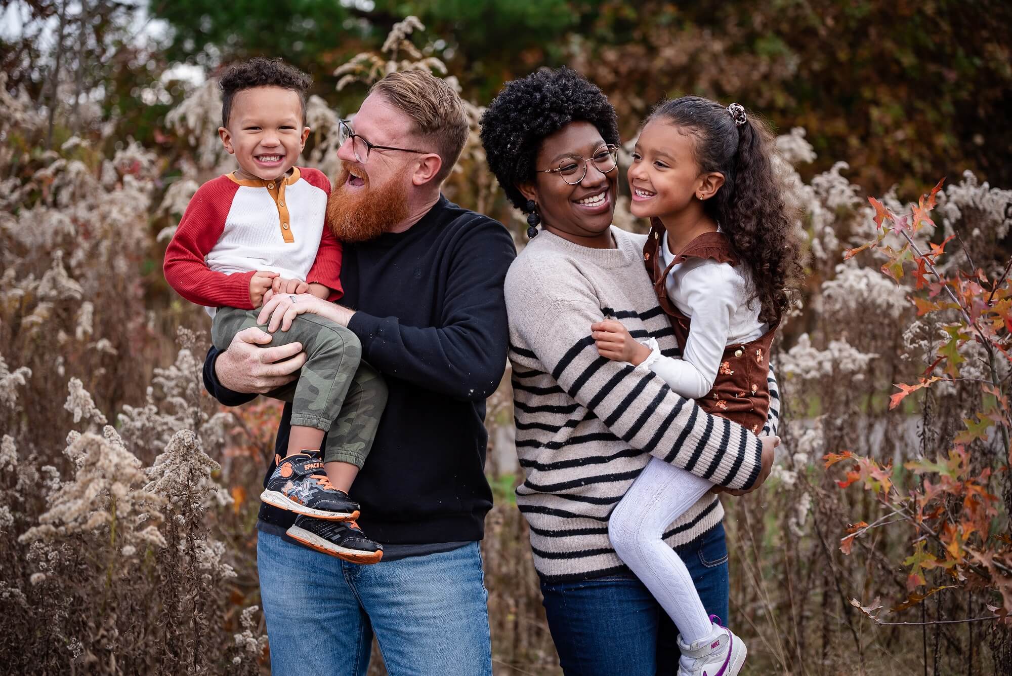 family playing together at a park for a fall session for Learning Express Westlake