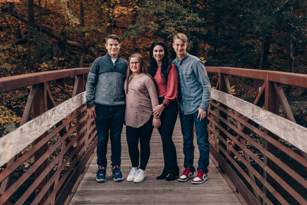 Mom with her three children during a fall family photography session in Northeast Ohio